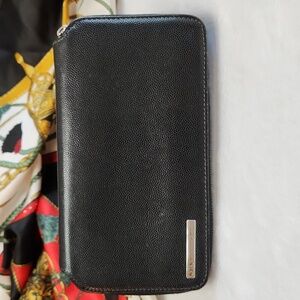 Cartier Black Pebbled Leather Zip Around Long Wallet